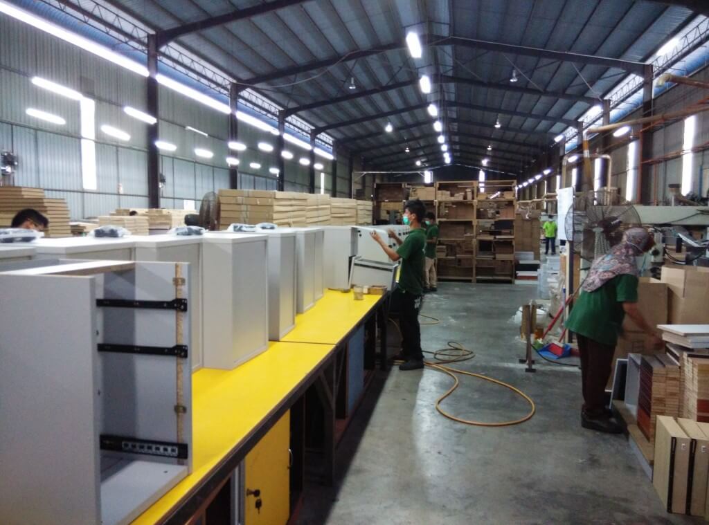 FIZONE OFFICE SYSTEM factory production area with office furniture assembly and material storage