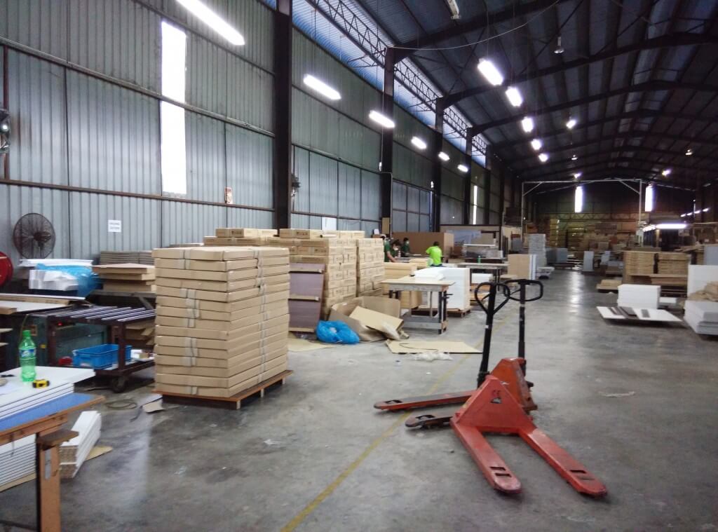 FIZONE OFFICE SYSTEM factory production area with office furniture assembly and material storage
