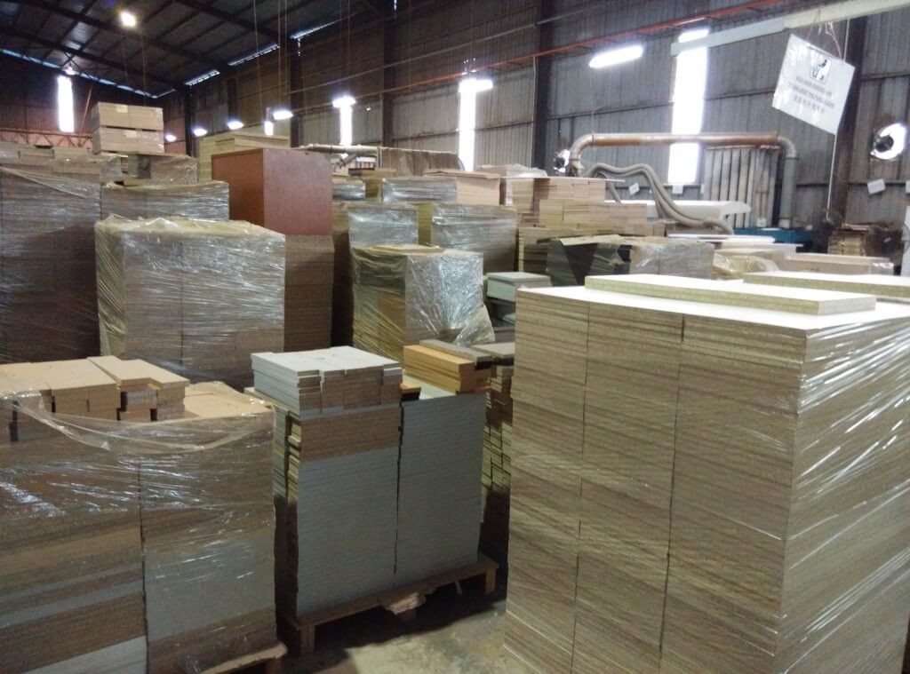 FIZONE OFFICE SYSTEM factory production area with office furniture assembly and material storage
