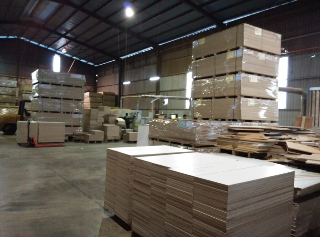 FIZONE OFFICE SYSTEM factory production area with office furniture assembly and material storage