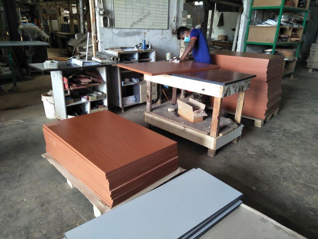 FIZONE OFFICE SYSTEM factory production area with office furniture assembly and material storage